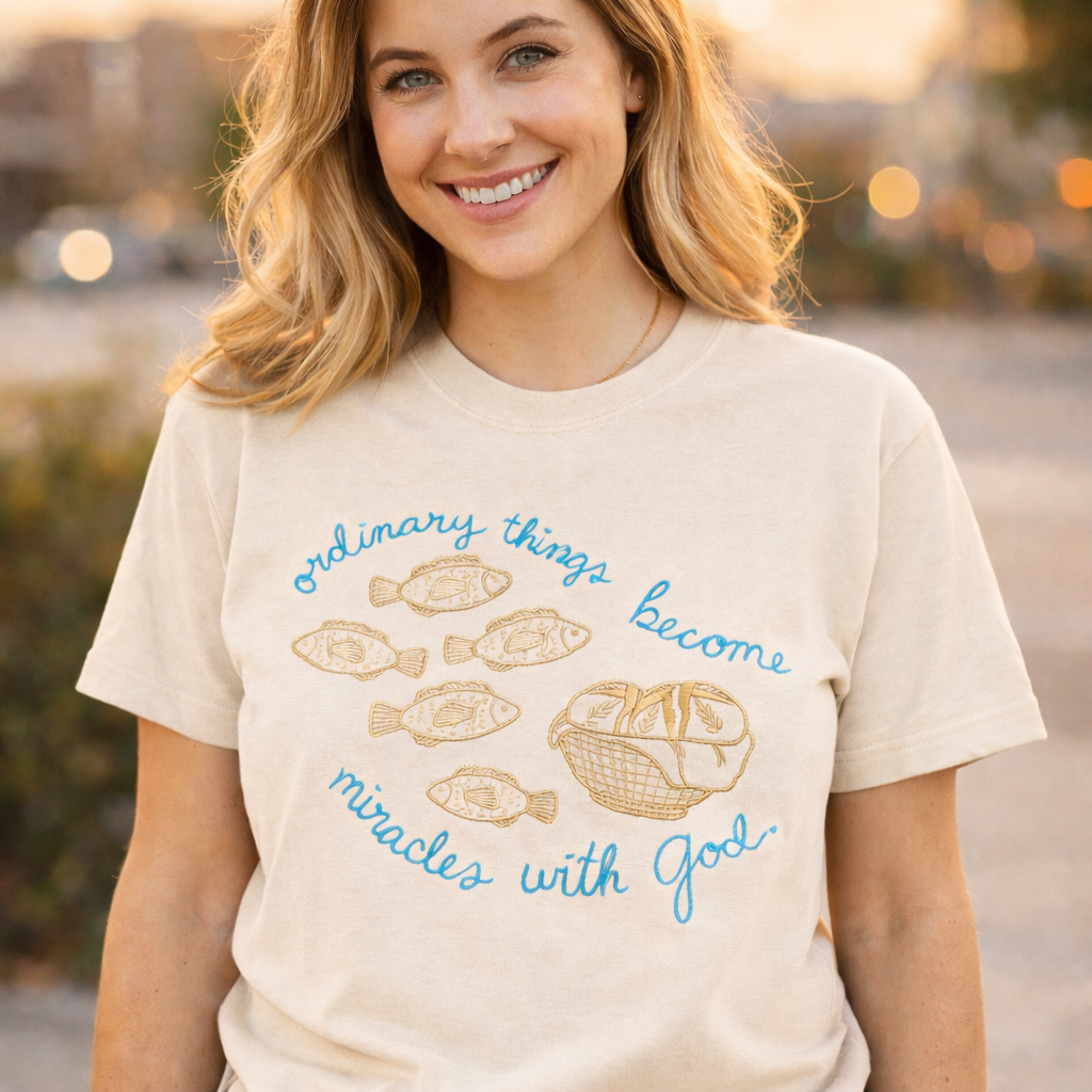 Woman wearing a t-shirt with a religious message outdoors